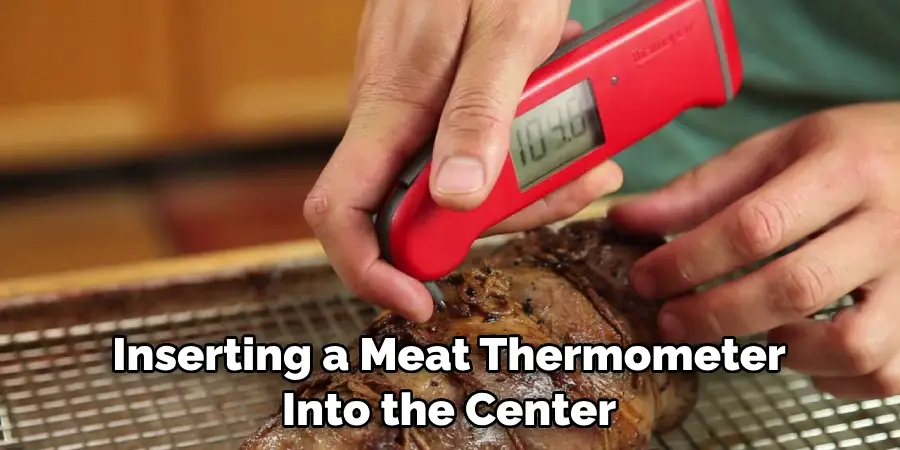 Inserting a Meat Thermometer Into the Center