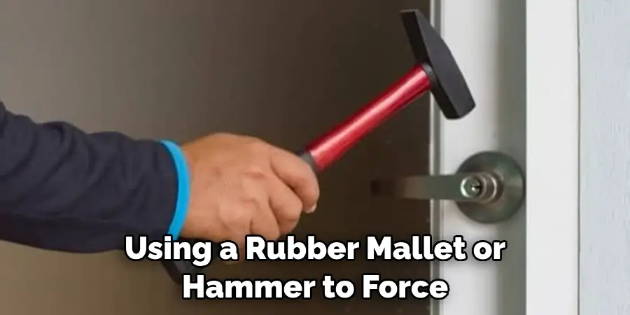 Using a Rubber Mallet or Hammer to Force the Latch Open