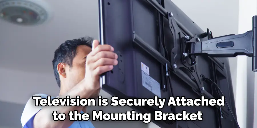  Television is Securely Attached to the Mounting Bracket