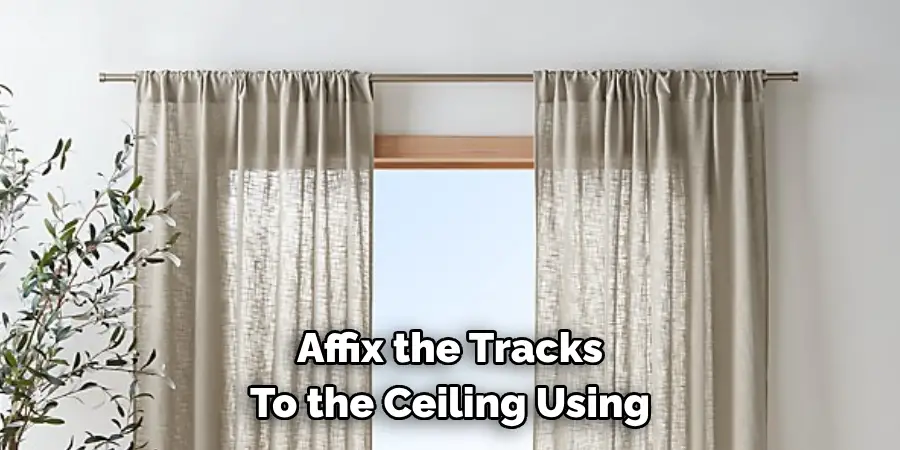 Affix the Tracks 
To the Ceiling Using