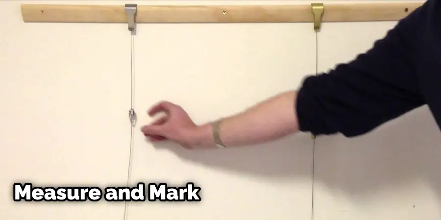 How to Hang Picture from Picture Rail