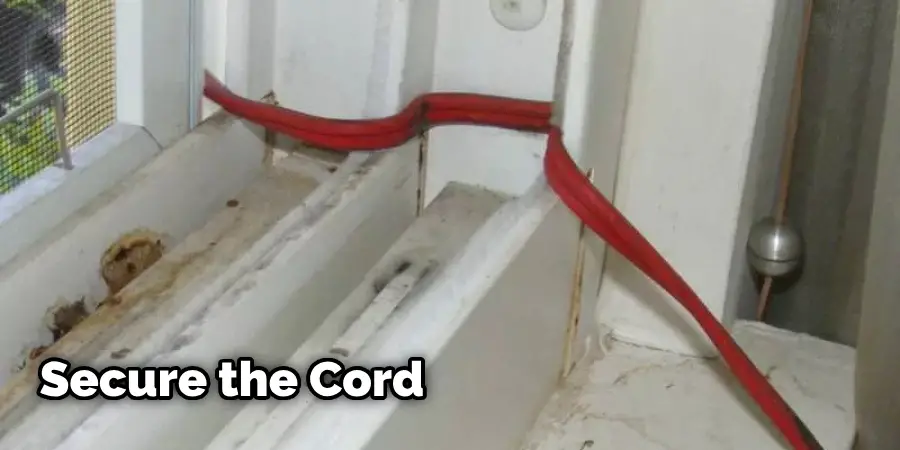 How to Run an Extension Cord Through a Wall