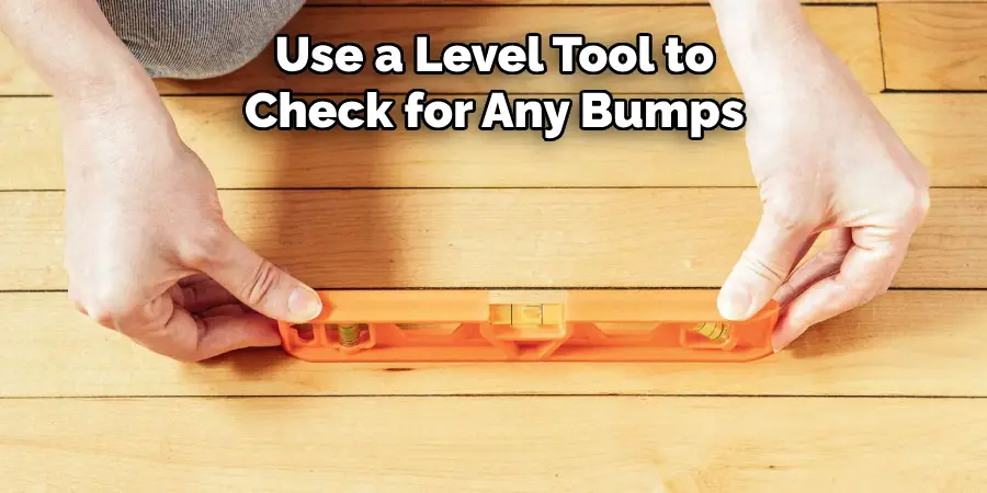 Use a Level Tool to Check for Any Bumps